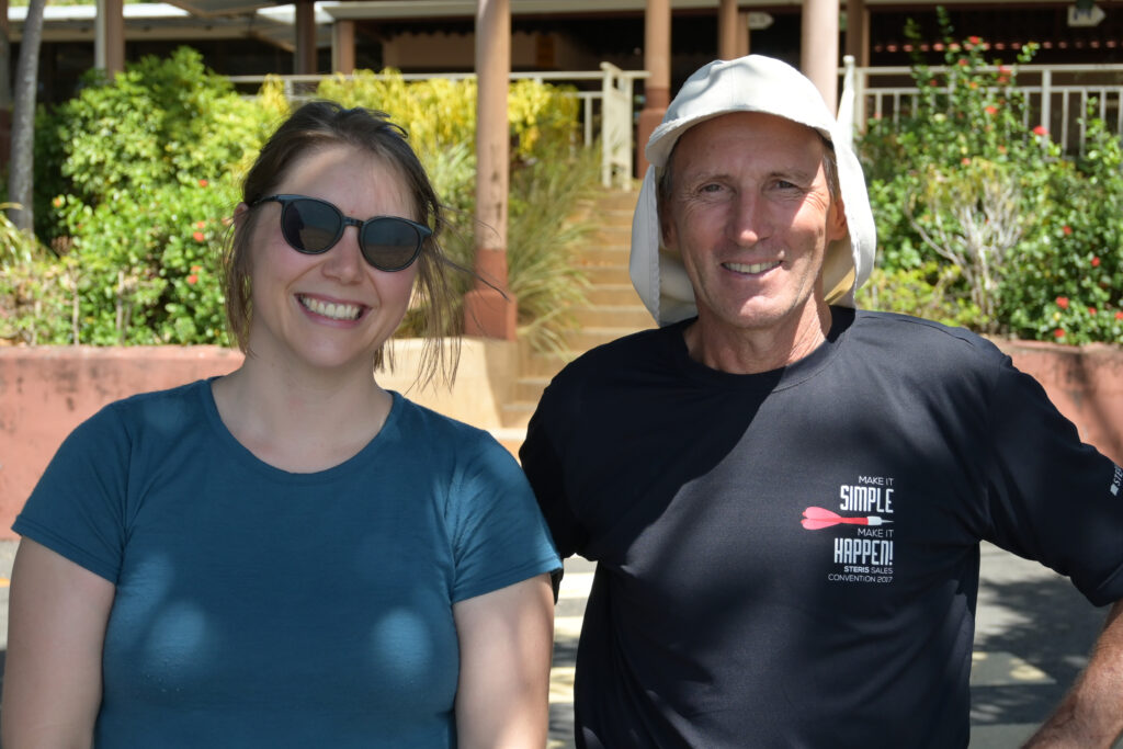 Two people in front of the building, Katy on the left, Jean-Claude on the right