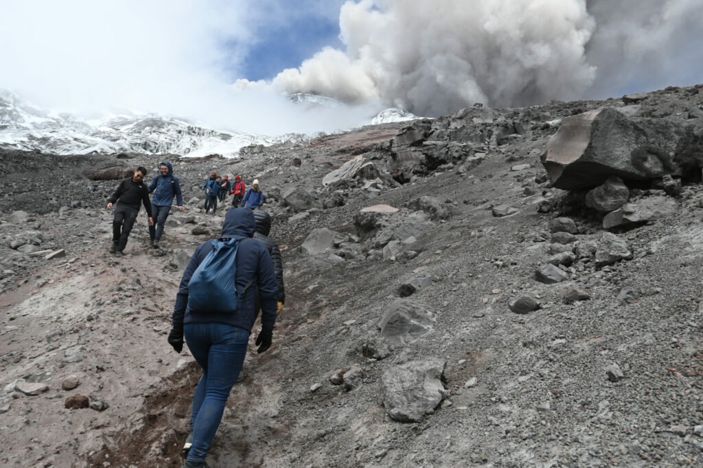 People hiking up and down a mountain